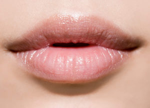 close-up of woman's lips after lip edge filler