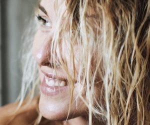 Young, smiling caucasian woman with blonde hair