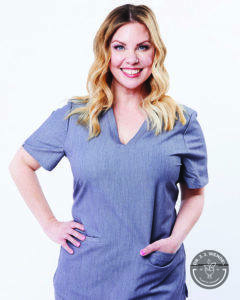 Headshot of Amanda Troester wearing blue shirt