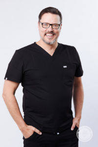 photo of Dr. Wendel in black scrubs