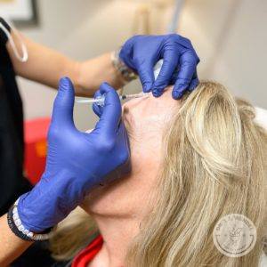woman receiving botox at dr j j wendel plastic surgery in nashville