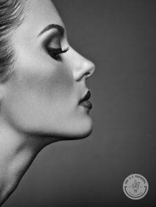 right profile view of woman with strong jawline and cheekbones