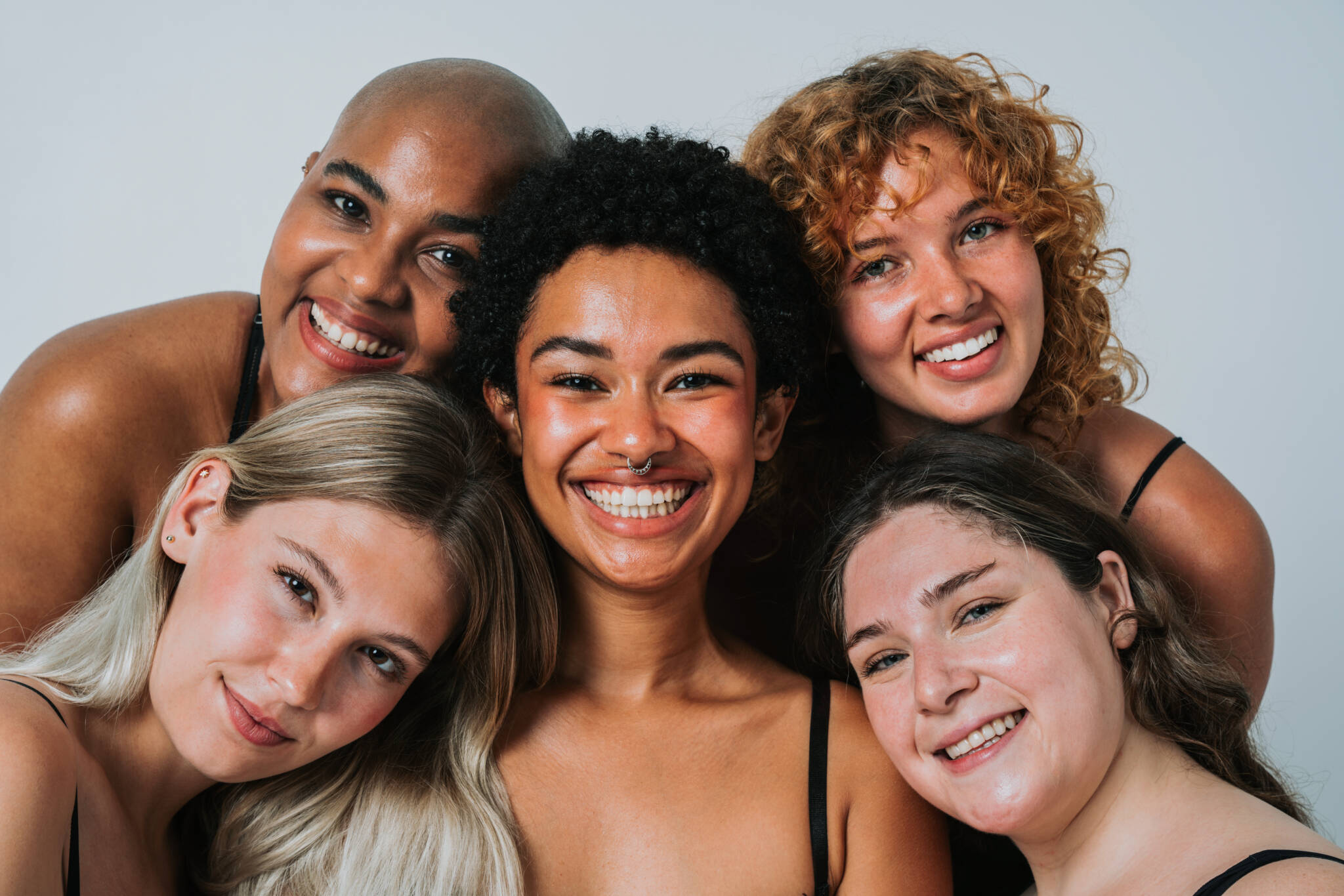Diverse group of women smiling