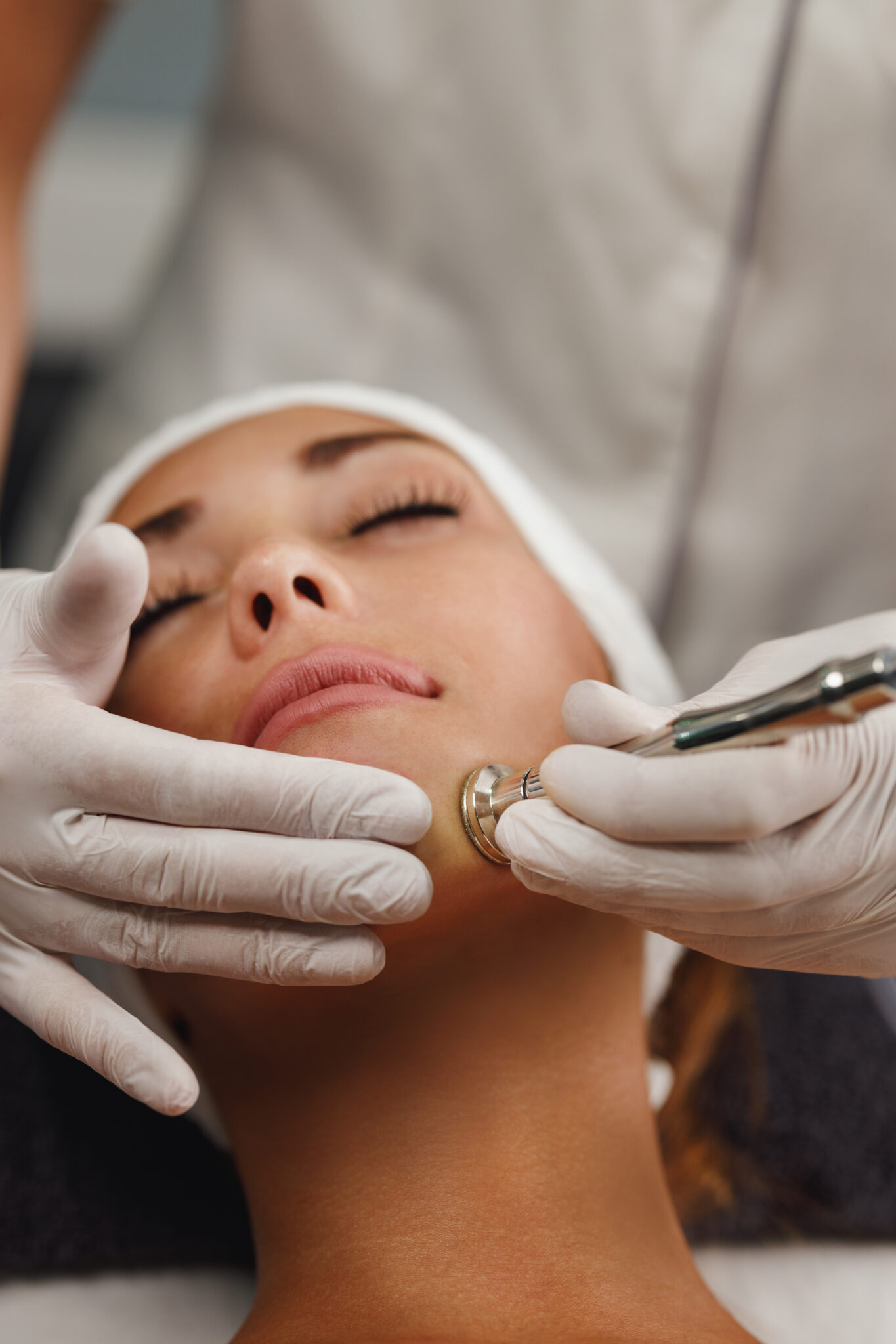 Woman receives a sculpting facial