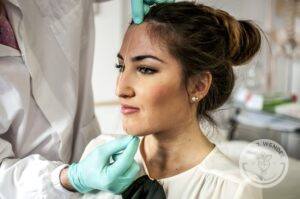 Woman has her face mapped for a rhinoplasty