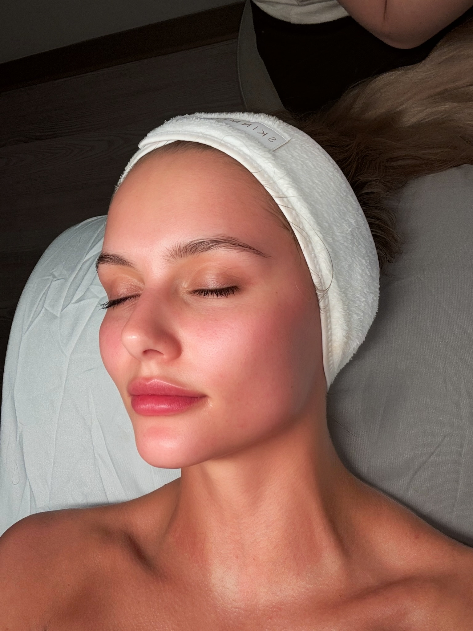 Client after a facial at SKINHAUS Beauty in Nashville