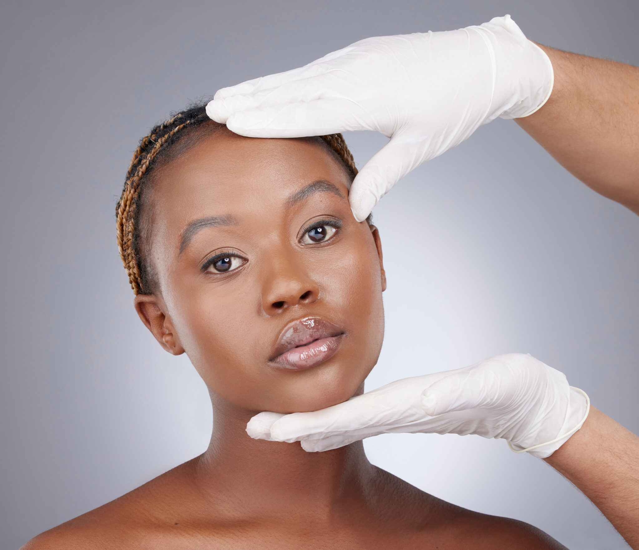 beautiful dark skinned woman at medical spa consultation