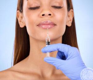 woman receiving facial filler injection